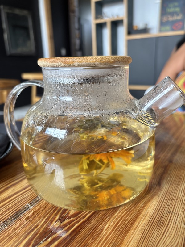 pot of blooming tea at afternoon tea at Peckish in Atlanta, Georgia