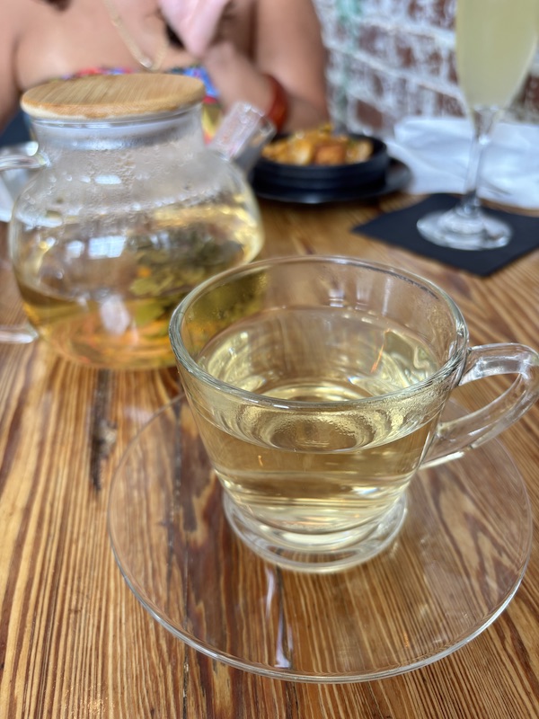 drinking tea at afternoon tea at Peckish in Atlanta, Georgia