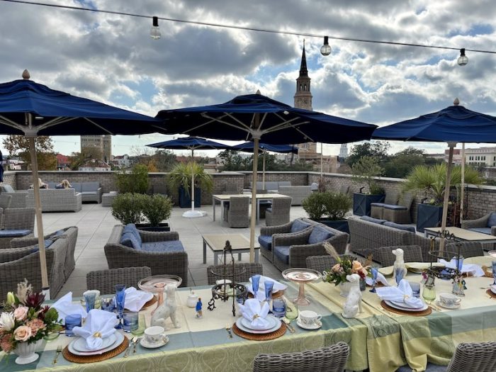 Rooftop table set for afternoon tea at The Loutrel in Charleston, South Carolina