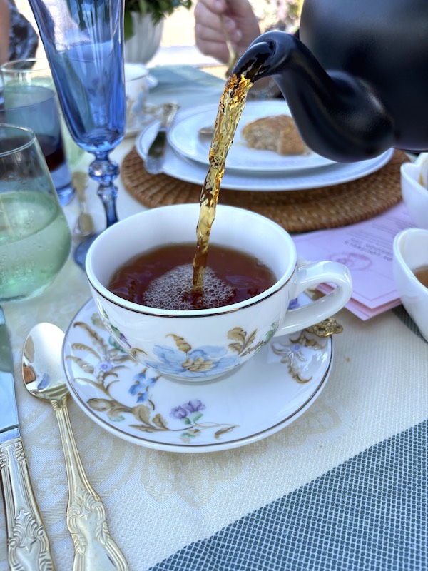 tea is poured at afternoon tea at The Loutrel in Charleston, South Carolina