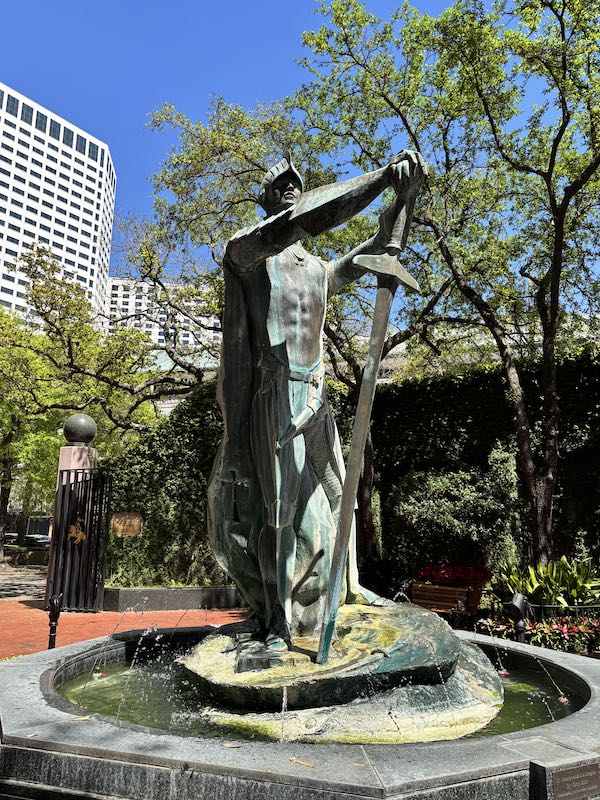 statue of St. George in garden courtyard at The Windsor Court, Le Salon in New Orleans, LA