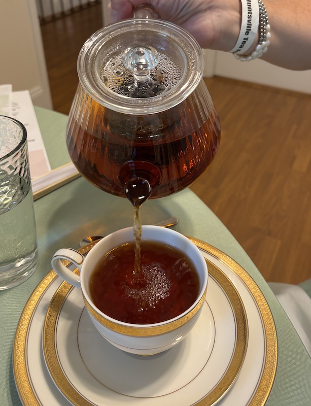 pouring tea at at Annabella at Cedar Glen in Huntsville, AL