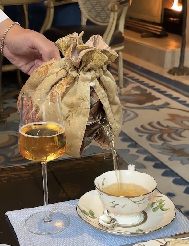 sparkling cider and tea is poured at afternoon tea at The Peninsula Beverly Hills, California